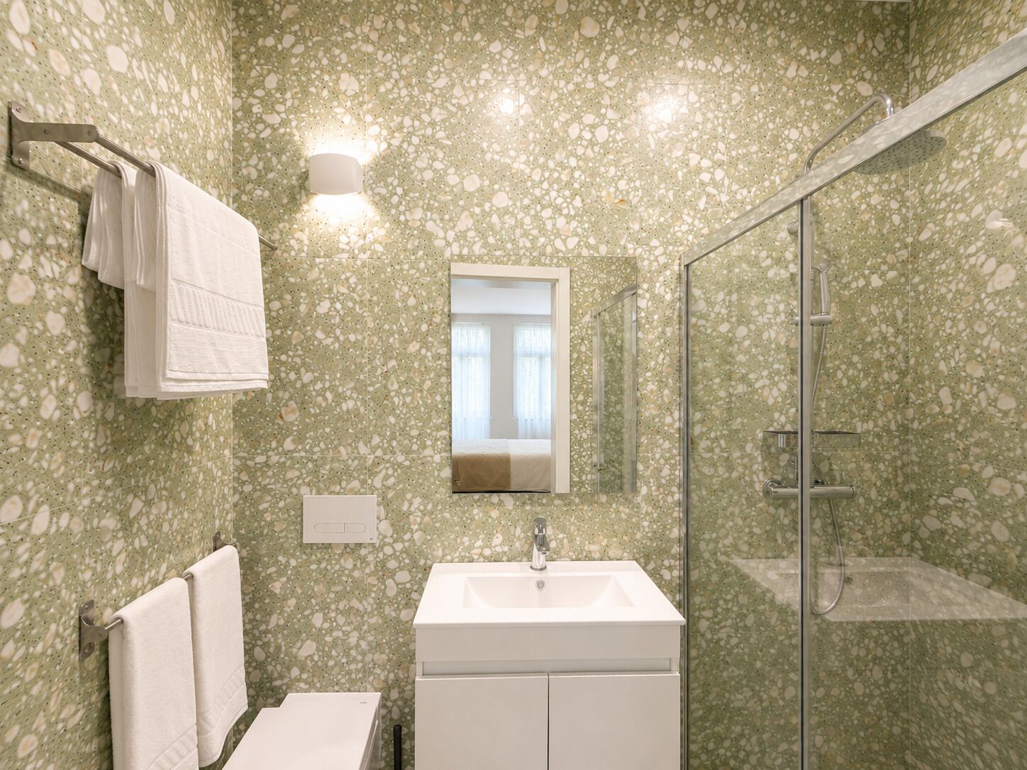 Shower, hair dryer, towels, toilet paper