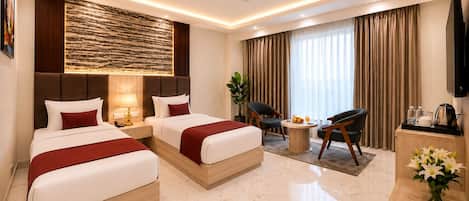 Chambre Deluxe avec lits jumeaux | Accès au Wi-Fi (inclus)