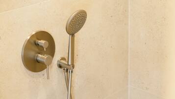 Deluxe Double Room, Balcony, City View | Bathroom | Shower, hair dryer, towels, soap