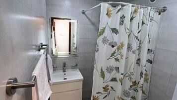 Hair dryer, towels, soap, toilet paper