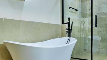Deluxe Apartment, Balcony, Beach View | Bathroom | Free toiletries, hair dryer, towels, soap