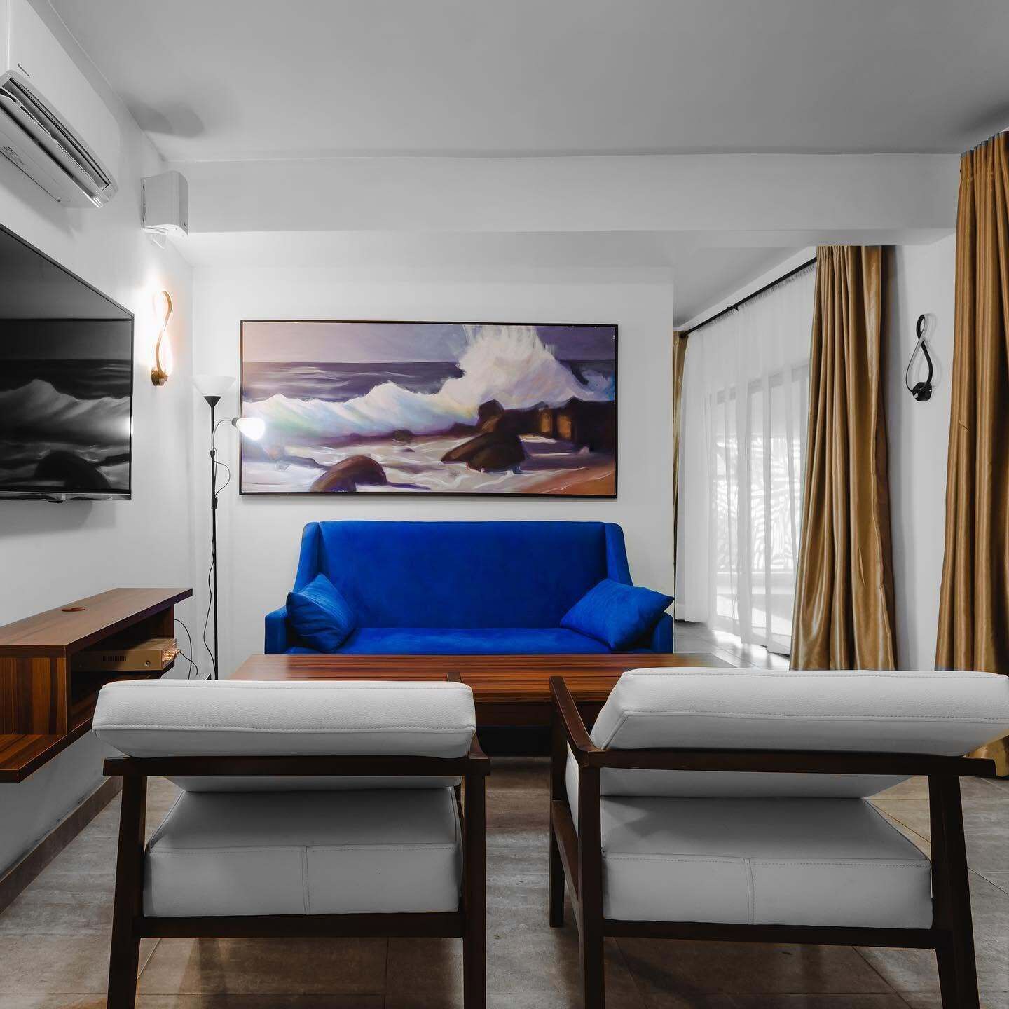 Deluxe Apartment, Balcony, Beach View | Living area