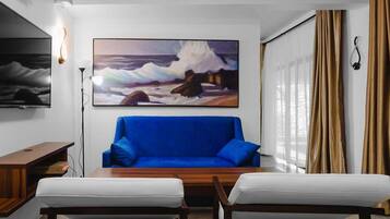 Deluxe Apartment, Balcony, Beach View | Living area