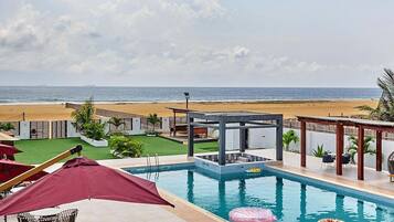 Deluxe Apartment, Balcony, Beach View | Pool