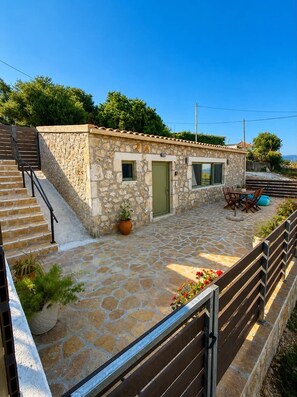 Outdoor dining - Authentic stone house with stunning sea views. (chalikeri)
