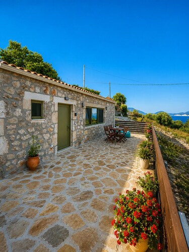 Authentic stone house with stunning sea views.