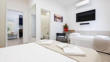 Dreibettzimmer | Zimmersafe, Verdunkelungsvorhänge, schallisolierte Zimmer