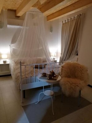 Quarto quádruplo, vista para o jardim