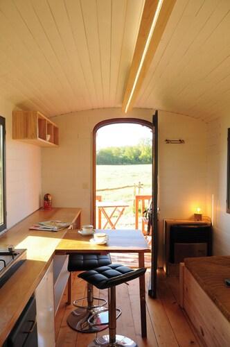 A rustic trailer in the heart of nature, complete with a sauna