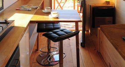 A rustic trailer in the heart of nature, complete with a sauna