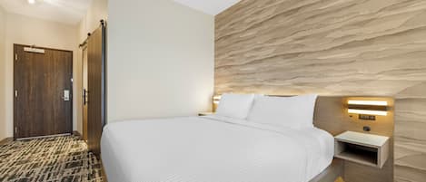 Chambre Deluxe, 1 très grand lit, non-fumeur | Lit avec matelas à plateau-coussin, coffre-fort pour ordinateur portable