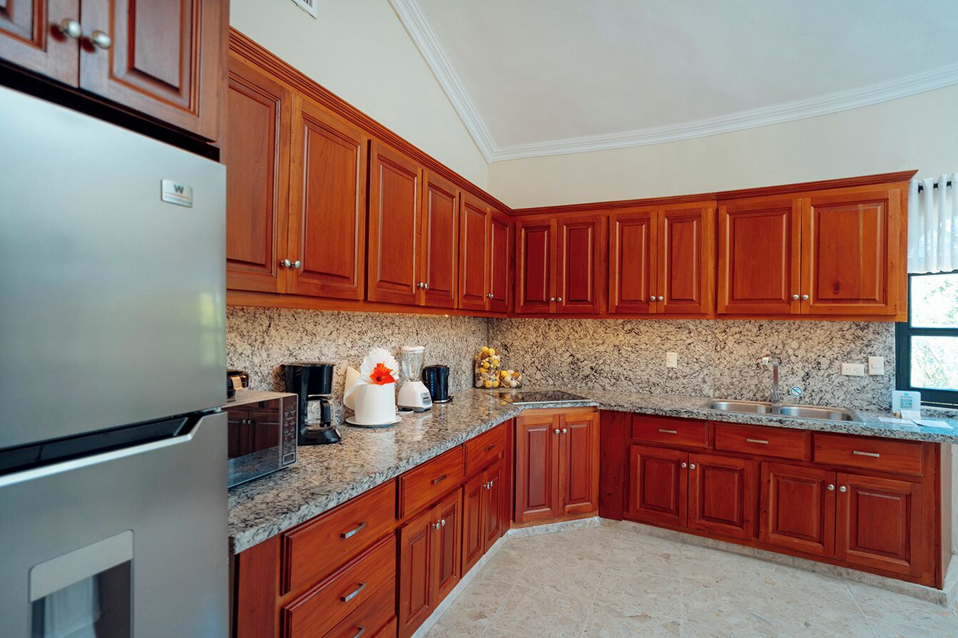 Luxury Villa | Private kitchen | Full-sized fridge, microwave, oven, stovetop