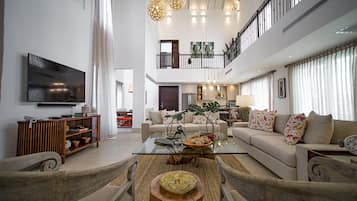 Royal Villas | Living area | 50-inch LED TV with digital channels