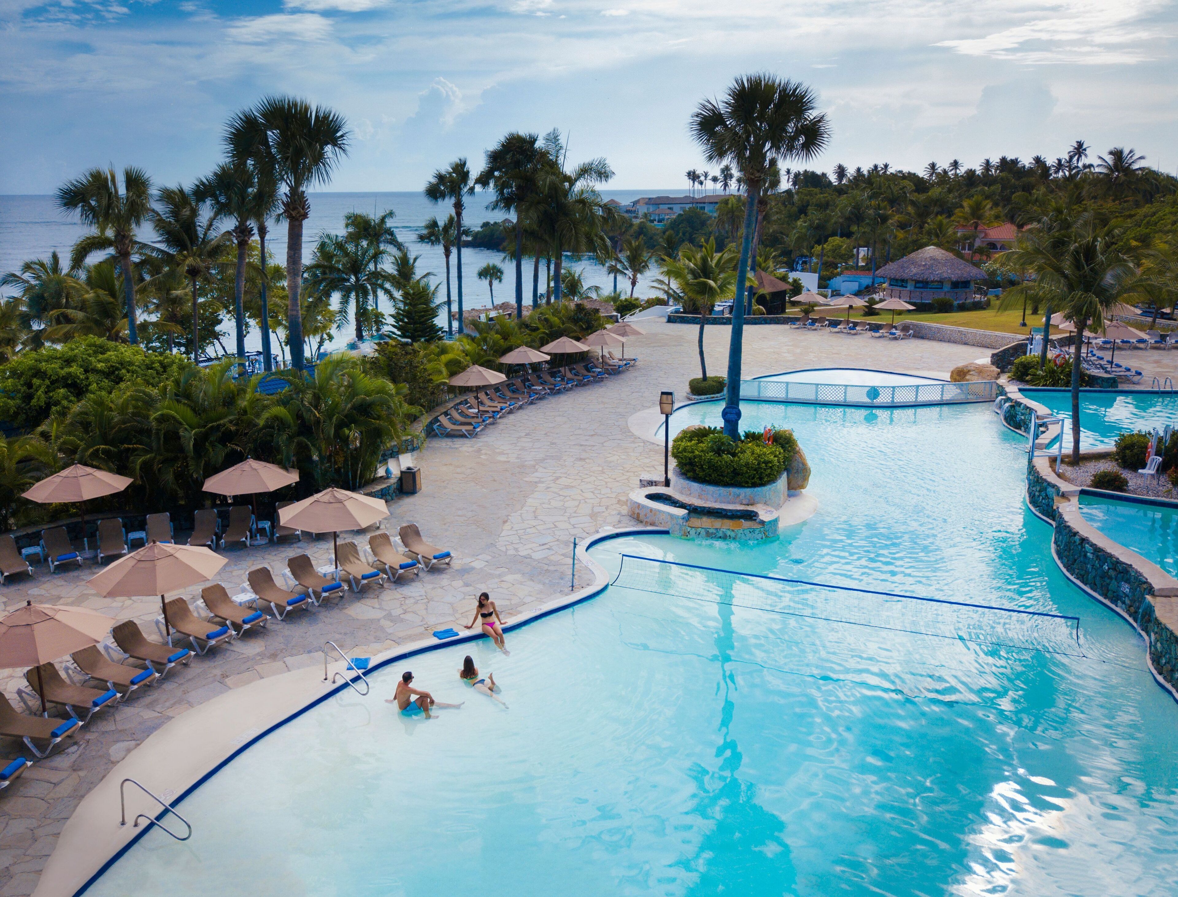 Outdoor pool, free pool cabanas, pool umbrellas