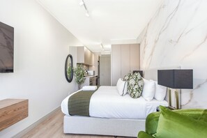 Coffres-forts dans les chambres, fer et planche à repasser