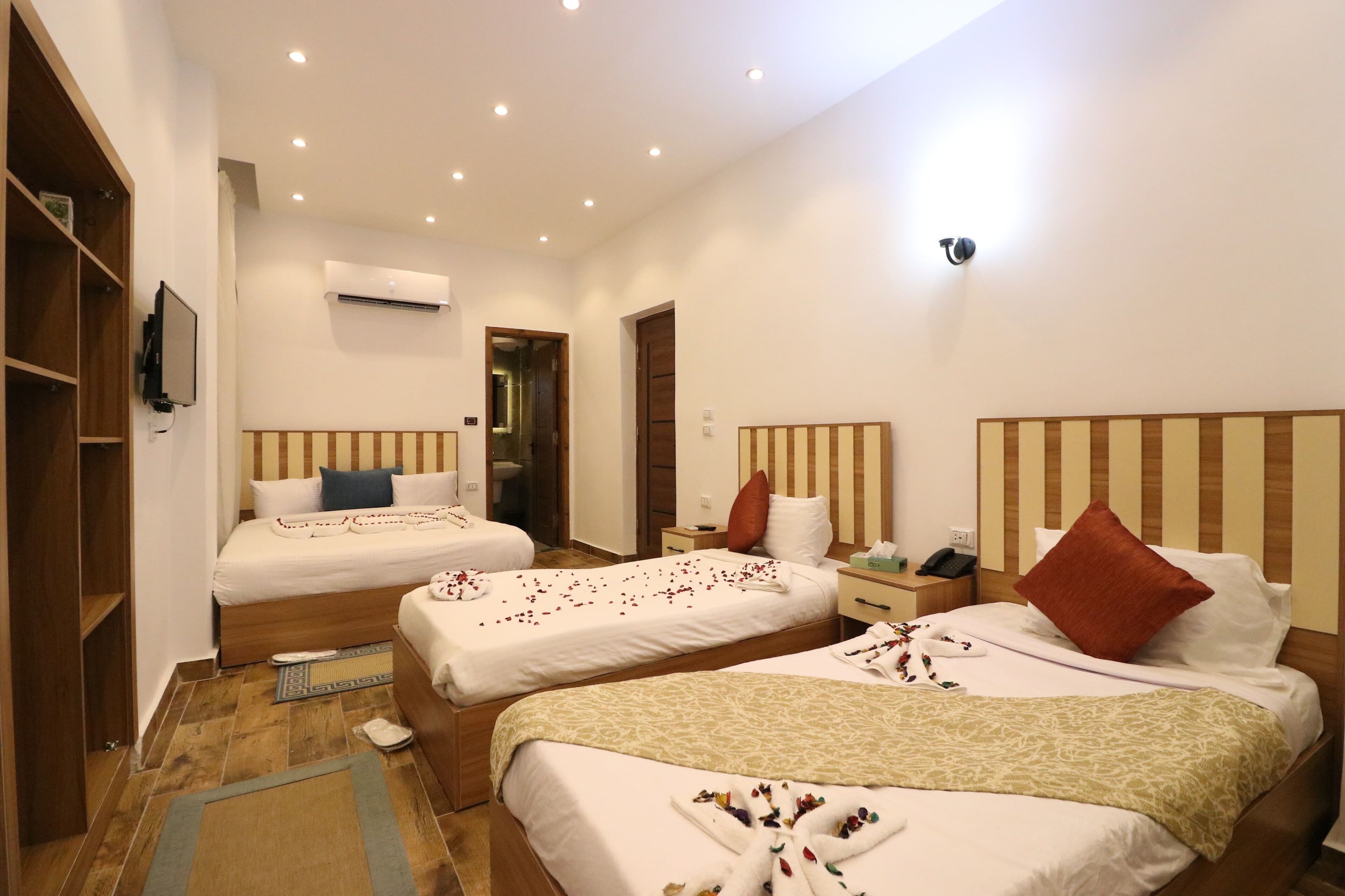 Deluxe Quadruple Room, Mountain View | Premium bedding, individually decorated, desk, free WiFi