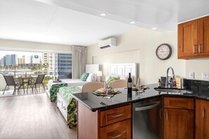 The open floor plan makes it easy to enjoy views even while cooking - Ilikai Suites | Studio with Ocean View | Car Incl. w/ 6 nights | ILK-437 by KBM (Honolulu)