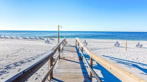 A wooden pier leading to a beach with clear skies. - Oceanfront Condo, Gated Entry, Pool, King Bed, <100 Steps to Sand.  (Pensacola)
