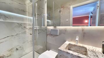 Hair dryer, towels, soap, toilet paper