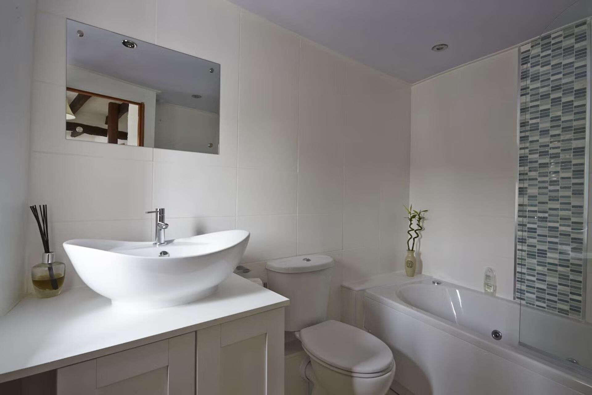 Combined shower/bathtub, deep-soaking bathtub, hair dryer, towels