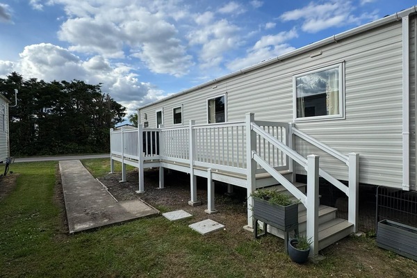 Create unforgettable family memories in 2026 with a stay at this dog-friendly 7 berth caravan located on Steeple Bay Holiday Park.