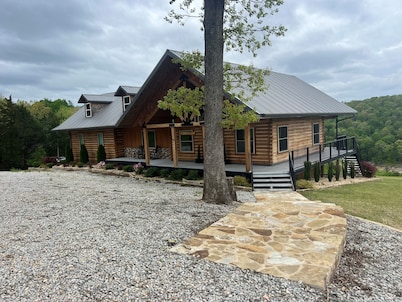 Custom Log Cabin Lake Home with Lake Views