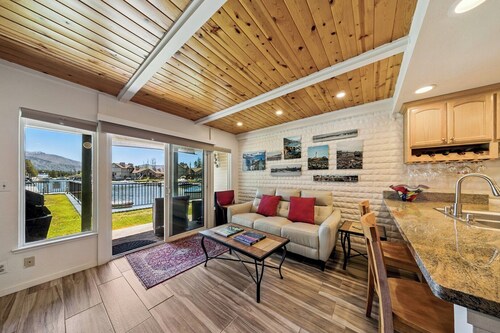 Waterfront Condo with Marina and Mountain Views