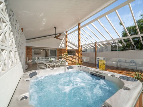 Coastal Comfort with a Private Spa Retreat
