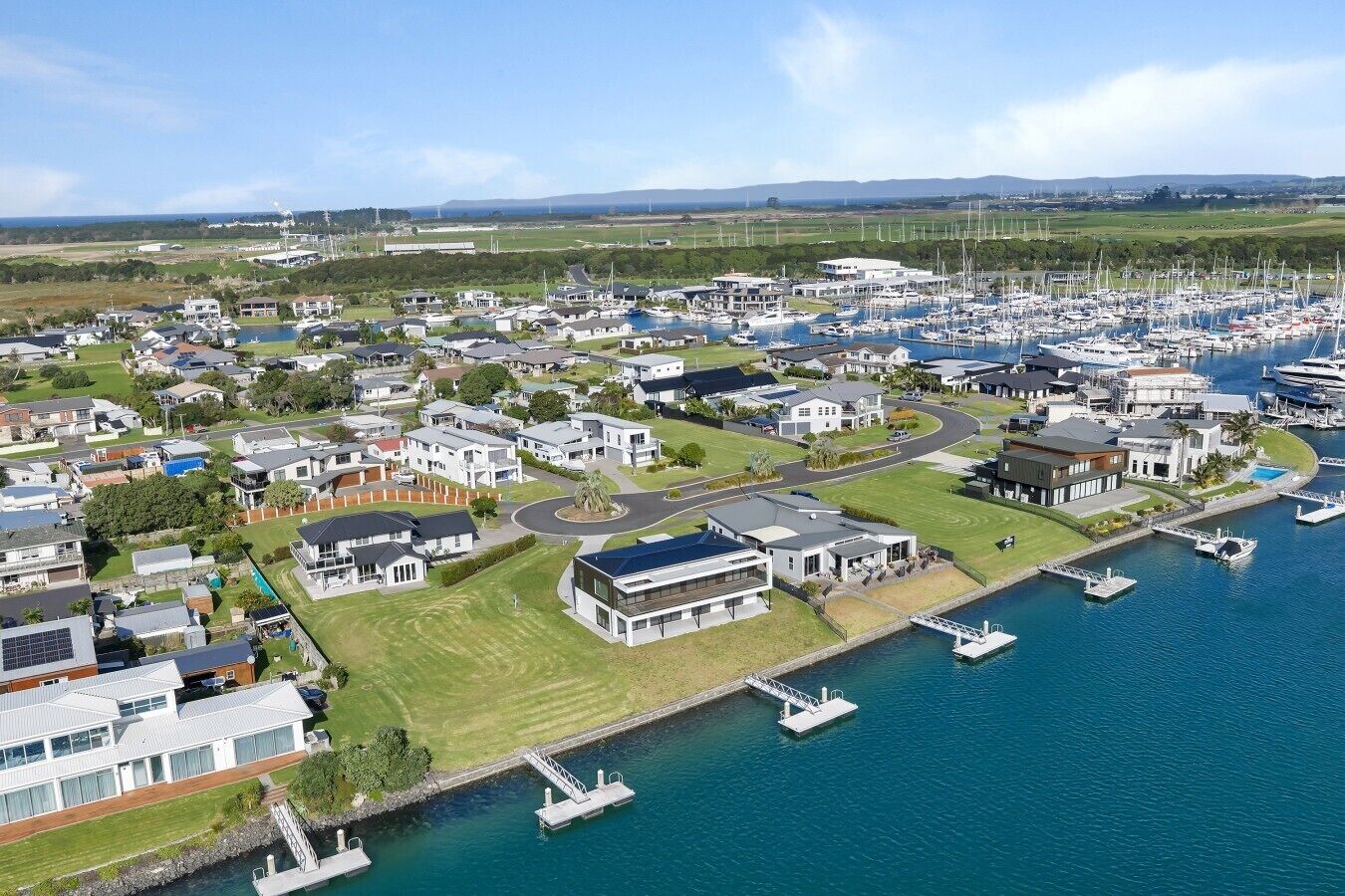 Aerial view of the property showing direct canal access and your own private jetty/pontoon (second from left)
