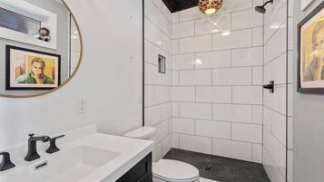 Shower, towels, soap, toilet paper