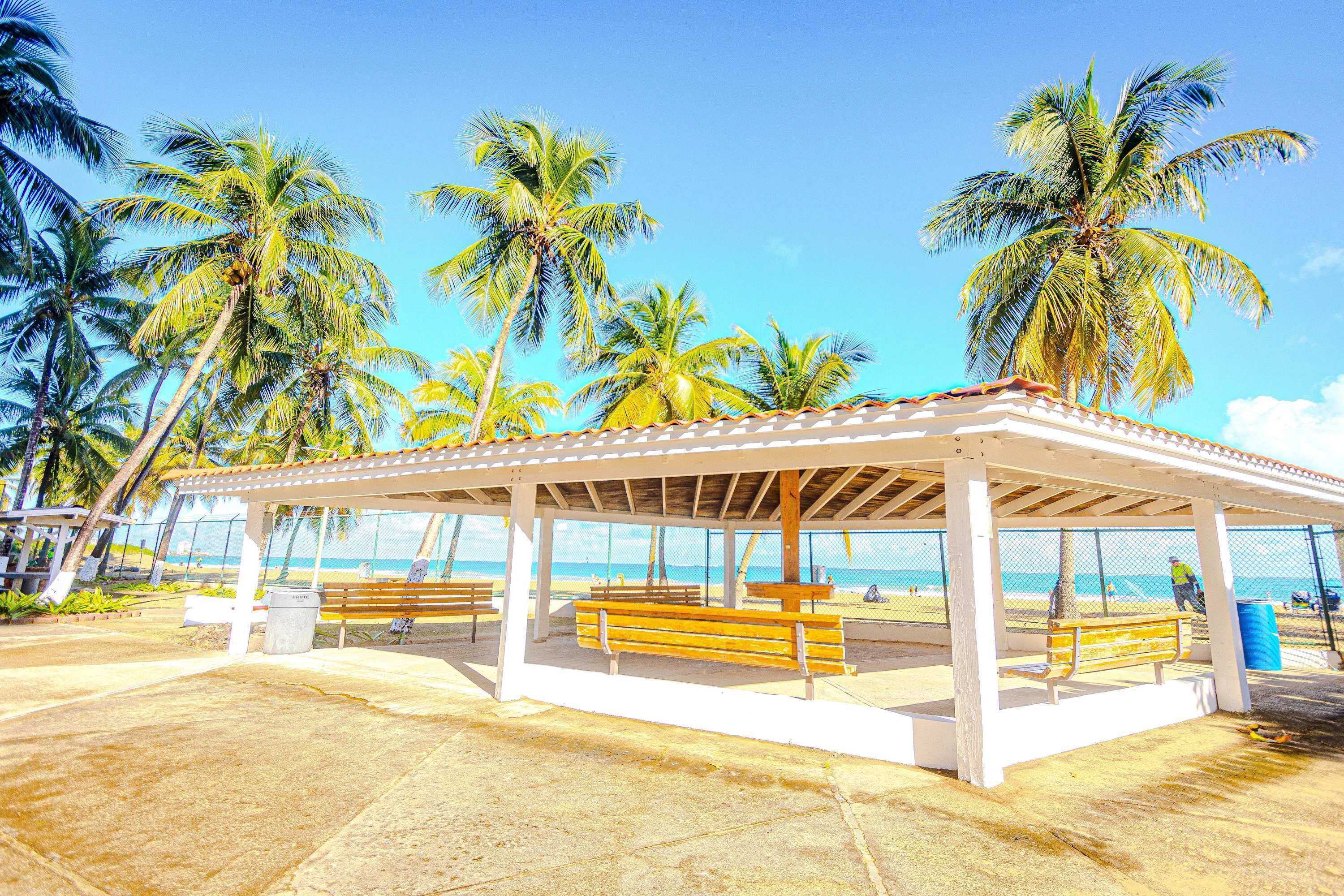 Unwind under this breezy beachfront gazebo, the perfect shaded spot to chill, sip, and soak in the island vibes just steps from the ocean.