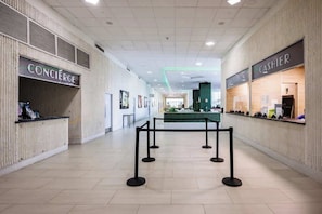 Modern reception area with concierge and guest services available to ensure a smooth, comfortable, and stress-free stay from check-in to check-out. - Isla Verde ESJ Towers Studio Apt with Queen Beds (Avenida Isla)