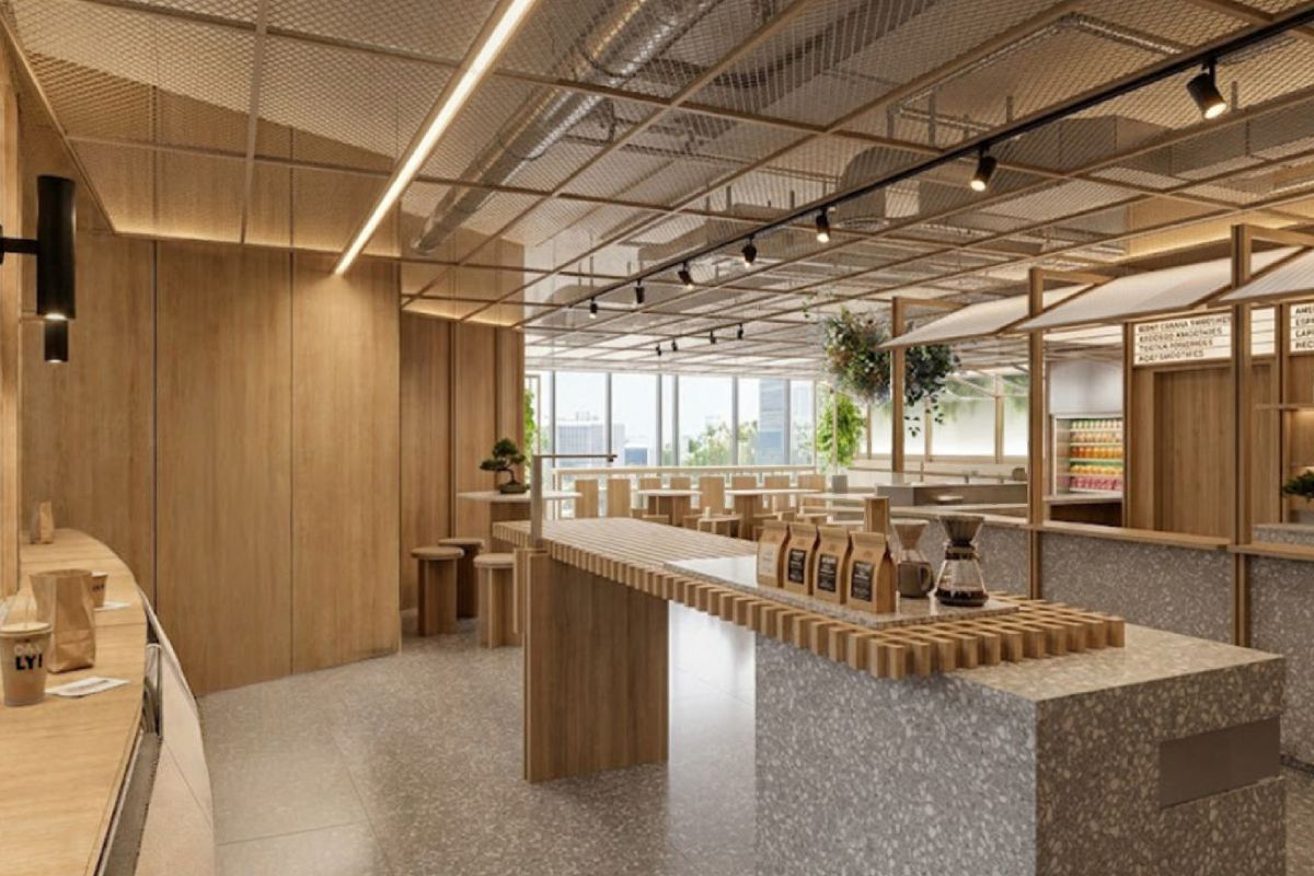 Un intérieur moderne avec un long comptoir d’accueil, des murs lambrissés et un plafond haut avec des poutres apparentes.