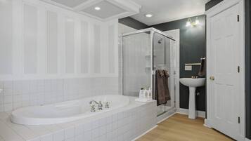 Shower, hair dryer, towels, shampoo