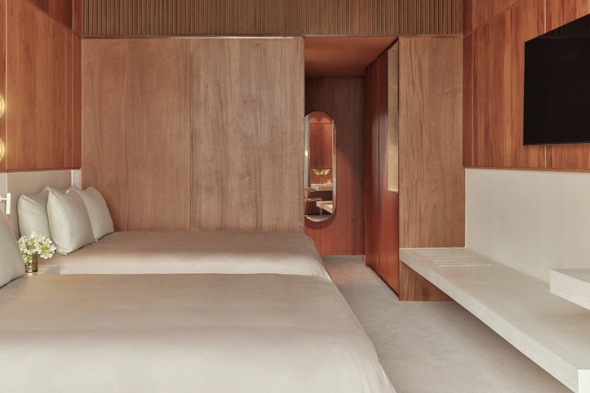Premium bedding, down duvets, Select Comfort beds, minibar