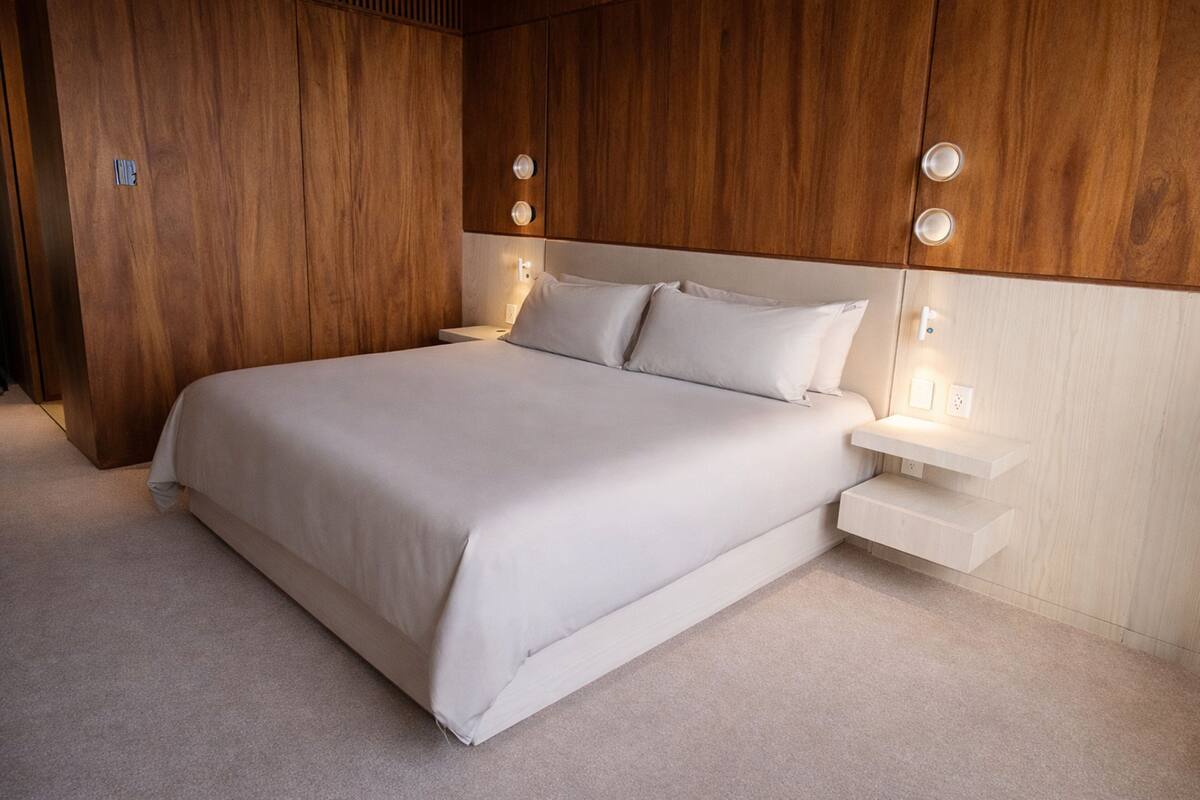 Premium bedding, down duvets, Select Comfort beds, minibar