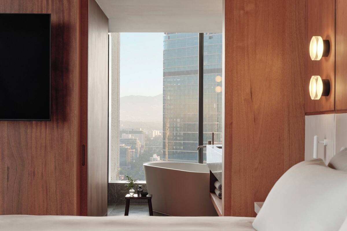 Premium bedding, down duvets, Select Comfort beds, minibar