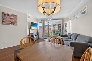 TV, fireplace, table football - Downtown Pool View 2 Bdrm 449 On The Lake (Kelowna)