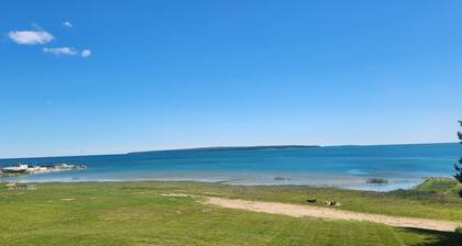 "Bluewater Beach" 5th wheel camper in Fairport - 435' of Lake Michigan shoreline