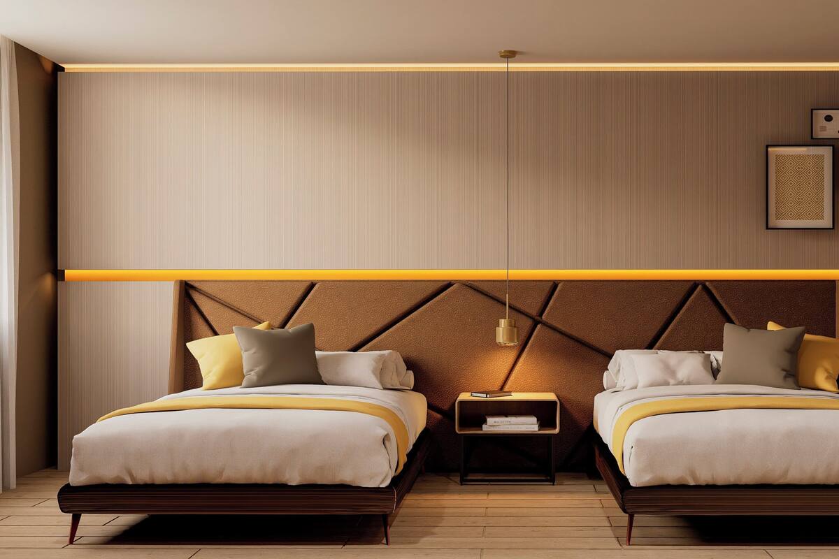 A modern hotel room with two beds, a nightstand, and a wall-mounted shelf.