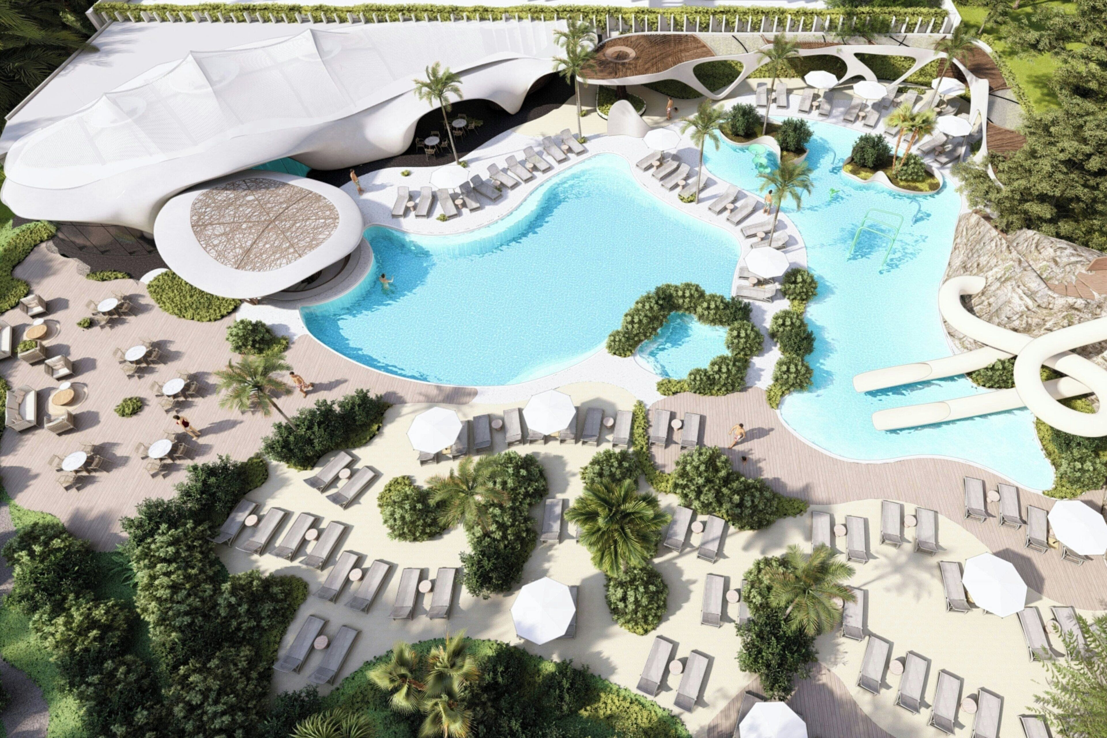 Un resort con una piscina grande, tumbonas y un diseño arquitectónico único.
