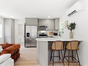 Coffee/tea maker, fridge, microwave, oven