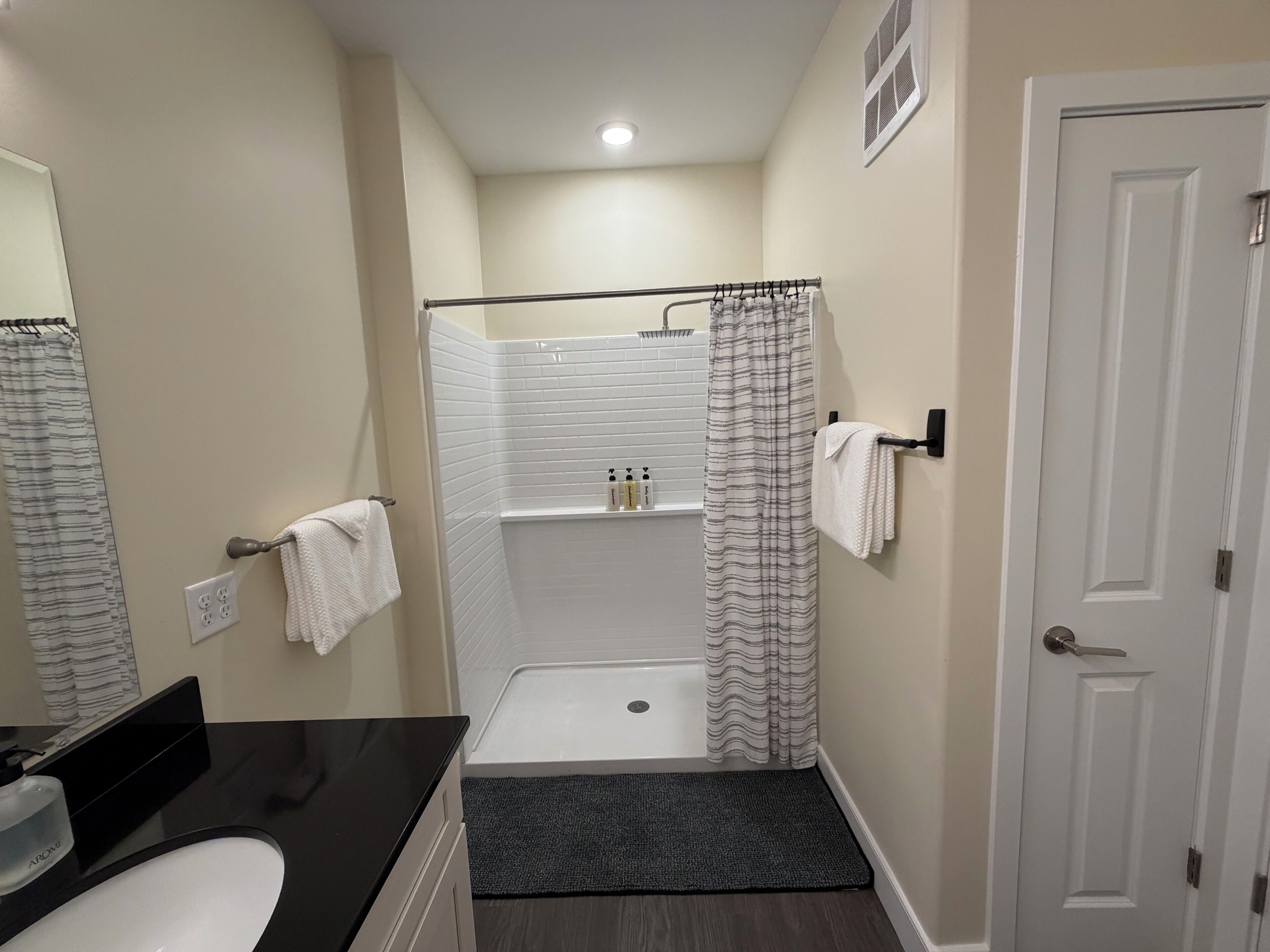 Shower, towels, soap, toilet paper