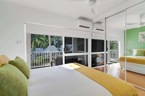 Lagoon Glow: Resort-Style Haven by Four Mile Beach