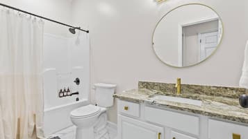 Hair dryer, towels, soap, shampoo