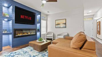 Smart TV, fireplace, ping pong, books