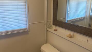 Hair dryer, towels, soap, toilet paper