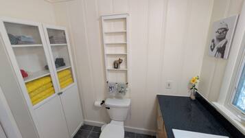 Shower, towels, soap, toilet paper