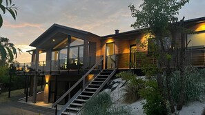 A modern house with a balcony, a staircase, and a large window. - VillaVilla 968 - Ebeltoft, Østjylland (Ebeltoft)