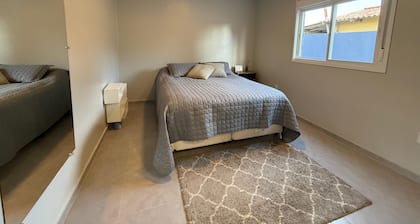 Comfortable new house with 3 bedrooms, en-suite, close to BR290, quiet location.